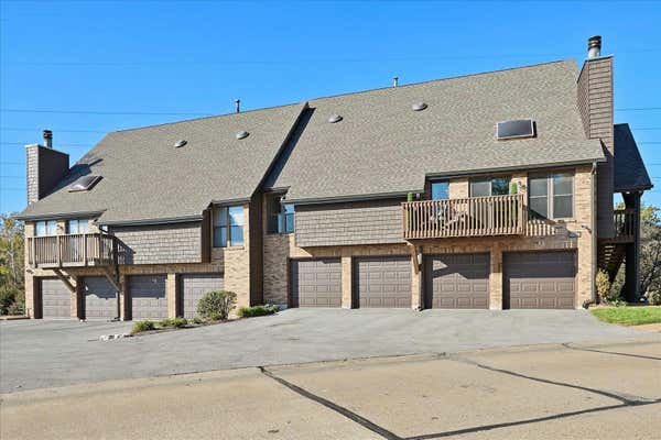 5107 HOLLOW WOOD CT APT D, SAINT LOUIS, MO 63128 - Image 1