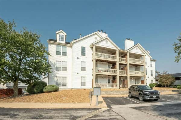 1445 WHISPERING CREEK DR APT E, BALLWIN, MO 63021 - Image 1