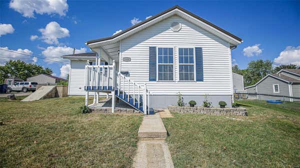 1006 JEFFERSON ST, DE SOTO, MO 63020, photo 4 of 37