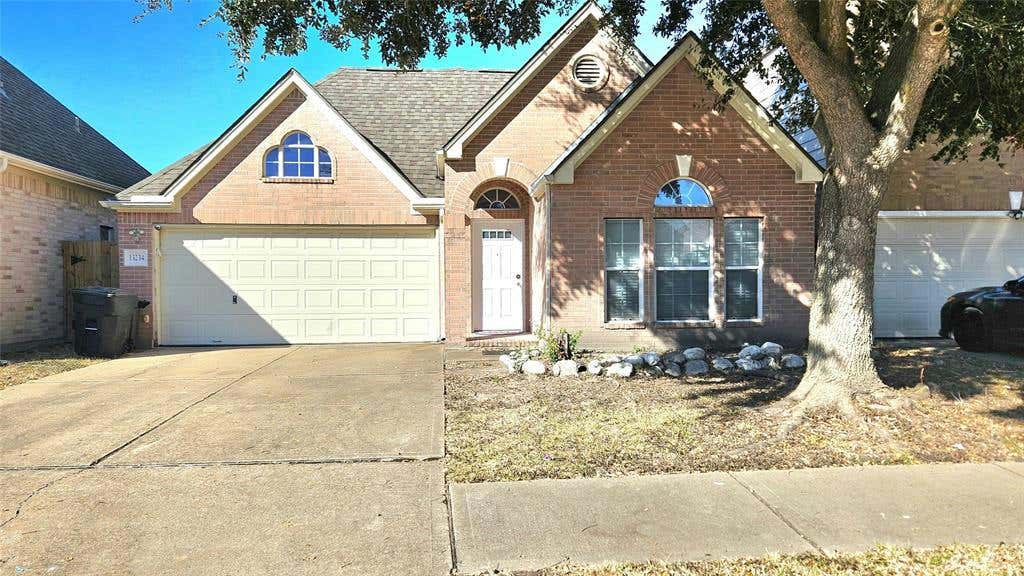 13234 RUSTIC GARDEN DR, HOUSTON, TX 77083, photo 1 of 14