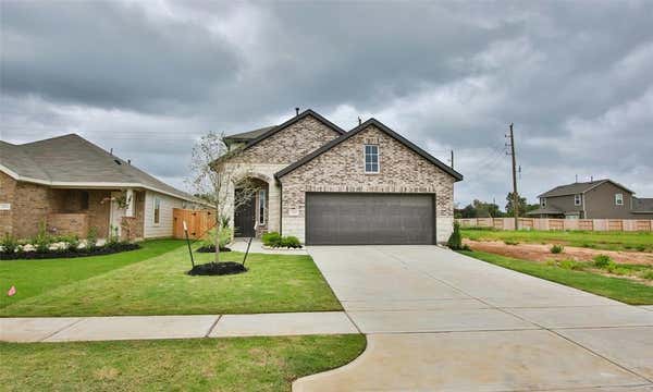 2967 COLONIA BLOSSOM LN, PINEHURST, TX 77362, photo 3 of 33