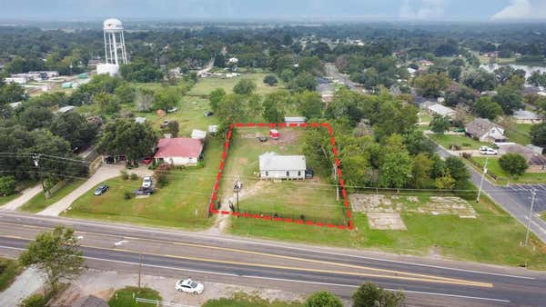 1015 N MAY ST, MADISONVILLE, TX 77864 - Image 1