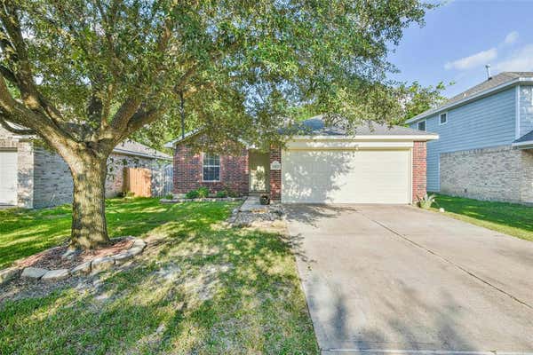 11823 BELLE CT, PINEHURST, TX 77362 - Image 1