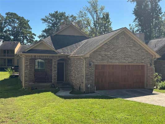 91 APRIL WIND DRIVE, CONROE, TX 77356 - Image 1