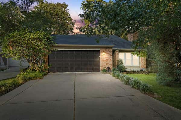 24 E WANDERING OAK DR, THE WOODLANDS, TX 77381 - Image 1