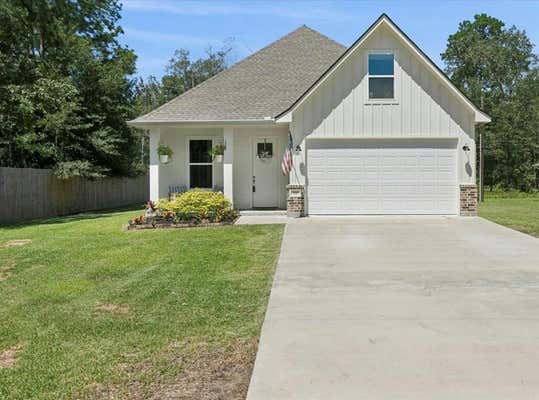 170 WOOD MANOR LN, SOUR LAKE, TX 77659 - Image 1