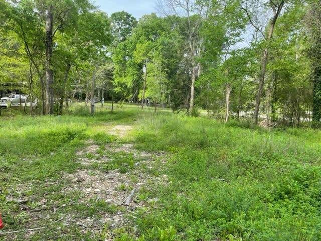 325 COUNTY ROAD 2113, CLEVELAND, TX 77327, photo 1 of 16