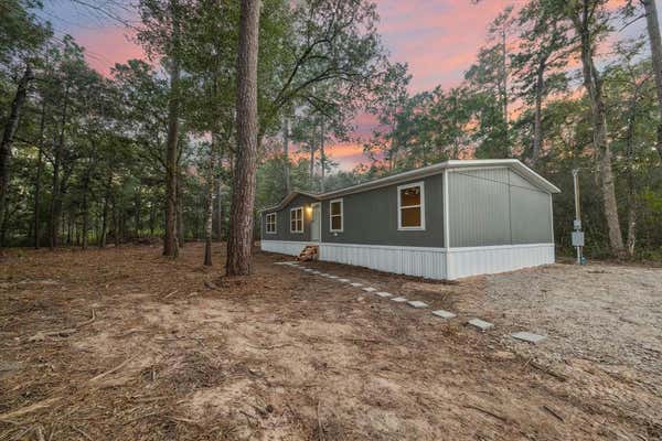 8012 TAWNY BERRY LN, PLANTERSVILLE, TX 77363 - Image 1