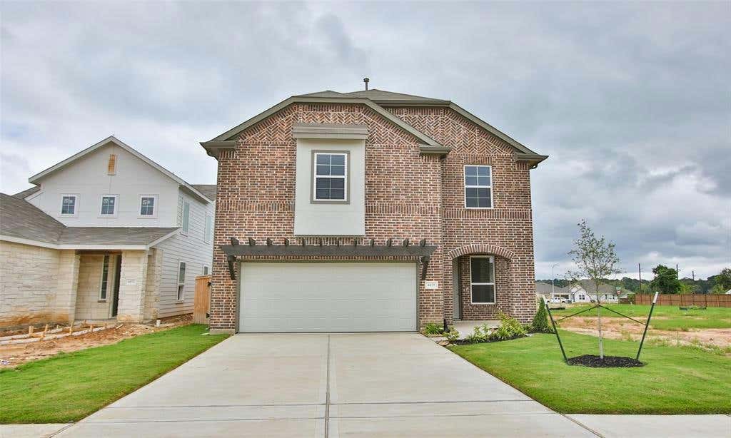 4439 AZALEA BLOSSOM ROAD, PINEHURST, TX 77362, photo 1 of 39