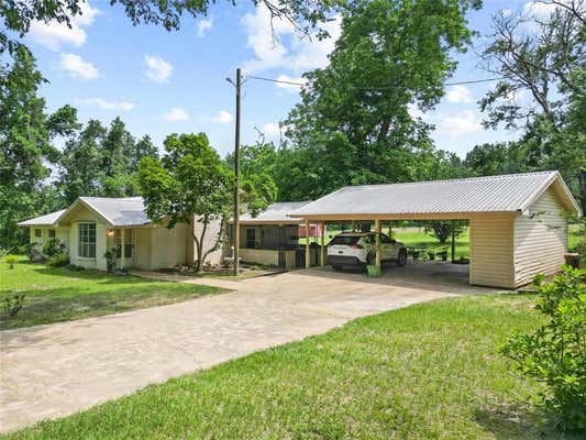 101 OLD QUARTERS RD, OAKHURST, TX 77359 - Image 1