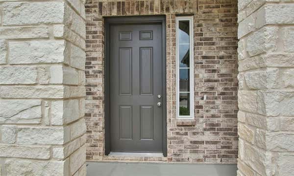 2967 COLONIA BLOSSOM LN, PINEHURST, TX 77362, photo 4 of 33