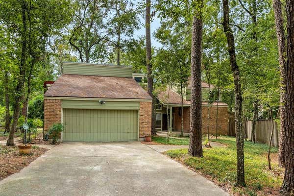 10711 E TIMBERWAGON CIR, THE WOODLANDS, TX 77380 - Image 1