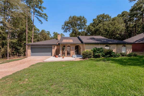 404 RIVER OAKS DR, HUNTSVILLE, TX 77340 - Image 1