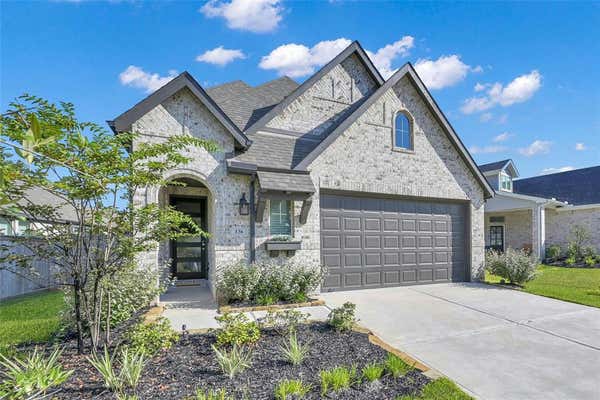 136 LUKEWOOD CIR, WILLIS, TX 77318 - Image 1