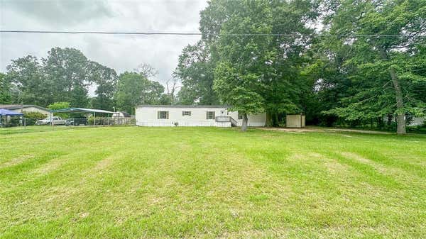 265 COUNTY ROAD 3310D, CLEVELAND, TX 77327 - Image 1