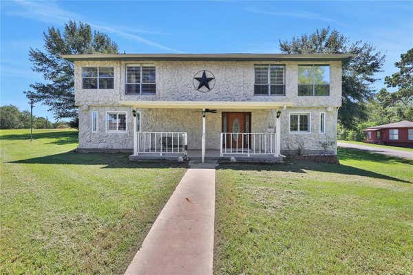 10 BREEZY RIDGE DR, COLDSPRING, TX 77331 - Image 1