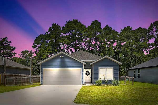 11242 MAGNOLIA DR, PLANTERSVILLE, TX 77363 - Image 1