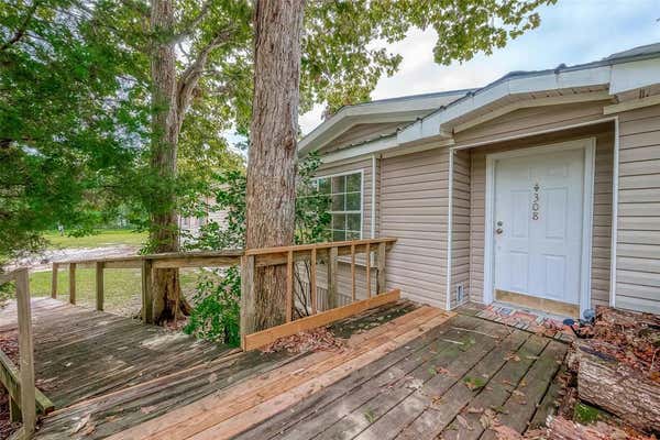 308 COUNTY ROAD 2218, CLEVELAND, TX 77327 - Image 1