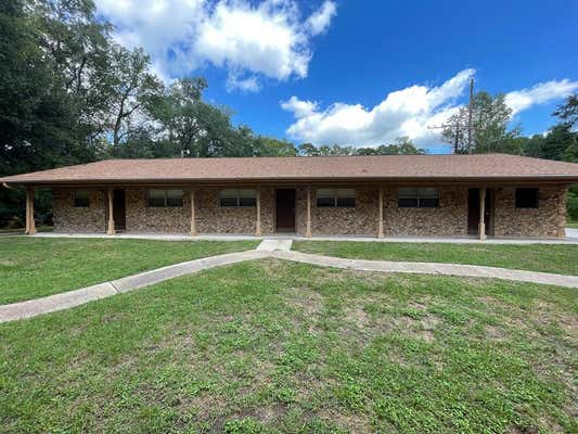 704 CLINE ST, HUNTSVILLE, TX 77340 - Image 1