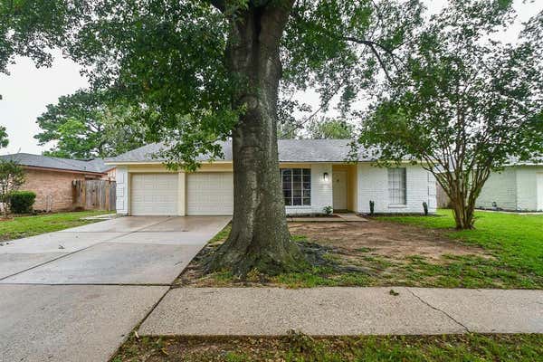 7682 BUBBLING SPRING LN, HOUSTON, TX 77086 - Image 1