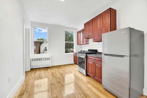 32-24 97TH ST, EAST ELMHURST, NY 11369 - Image 1