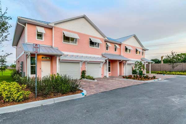 221 IVORY CORAL LN APT 102, MERRITT ISLAND, FL 32953 - Image 1