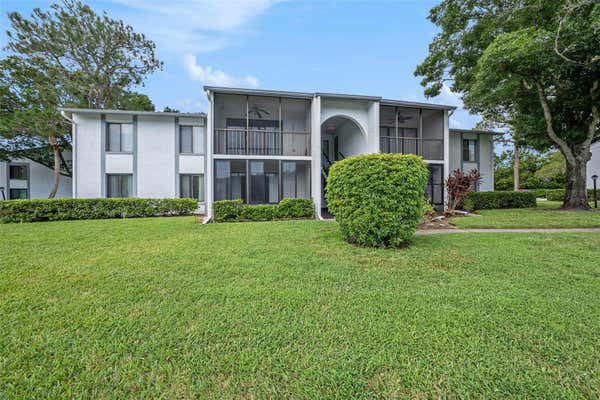 1143 PINE RIDGE CIR W APT C1, TARPON SPRINGS, FL 34688 - Image 1