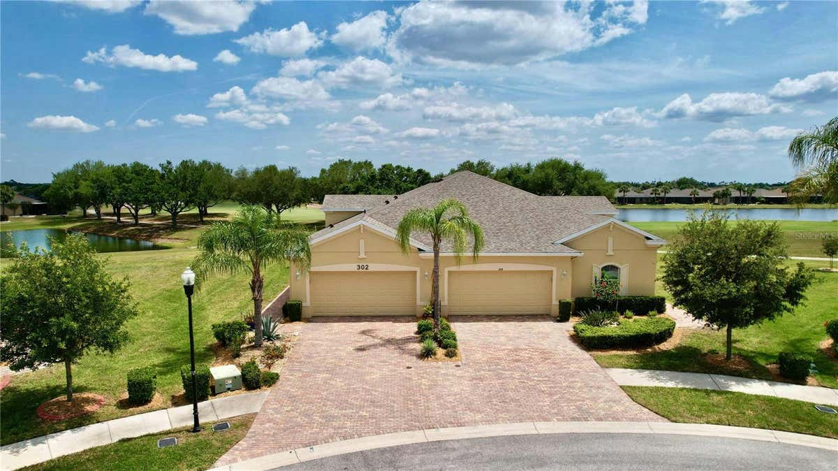 302 CRYSTAL DOWNS CT, SUN CITY CENTER, FL 33573, photo 1 of 65