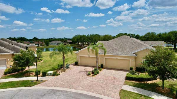 302 CRYSTAL DOWNS CT, SUN CITY CENTER, FL 33573, photo 2 of 65