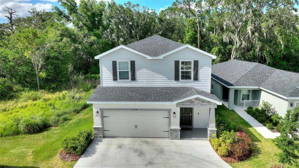 2108 GOLDEN BEAK DR, EAGLE LAKE, FL 33839, photo 5 of 58