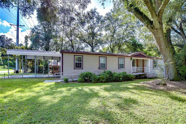 10035 E FOWLER AVE, THONOTOSASSA, FL 33592 - Image 1