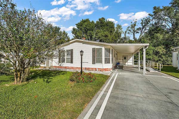 1215 E SCHWARTZ BLVD, LADY LAKE, FL 32159 - Image 1