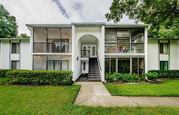 1170 PINE RIDGE CIR W APT C2, TARPON SPRINGS, FL 34688 - Image 1