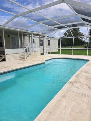 16730 SE 152ND PLACE RD, WEIRSDALE, FL 32195, photo 3 of 75