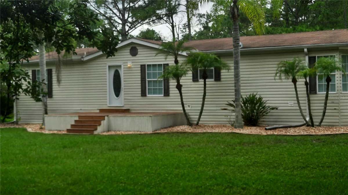 2148 AVOCADO BLVD, BUNNELL, FL 32110, photo 1 of 100