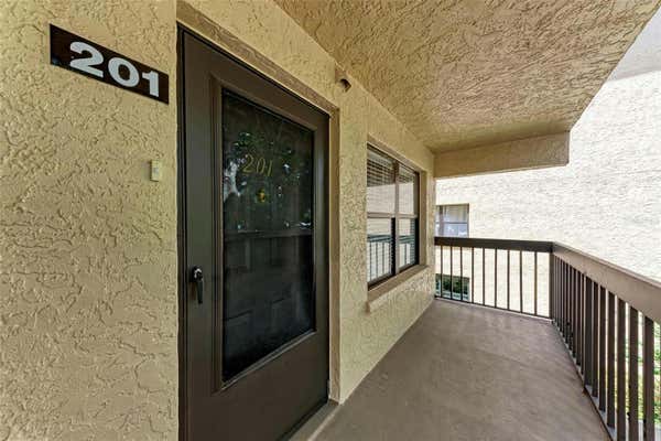 515 30TH AVE W APT H201, BRADENTON, FL 34205 - Image 1