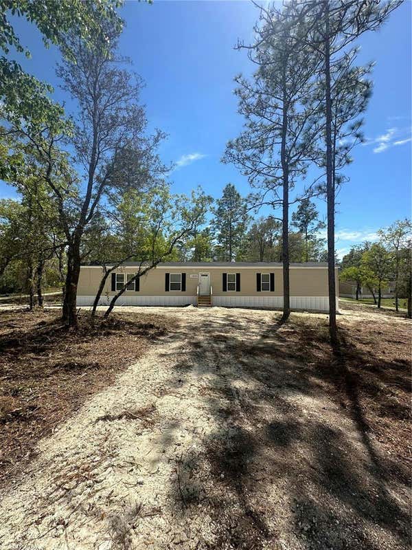 13850 SE 25TH ST, MORRISTON, FL 32668, photo 1 of 32