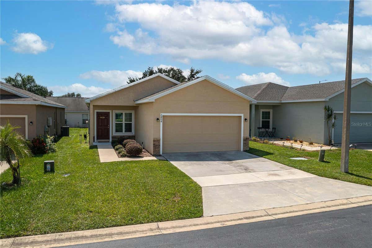 2804 WHISPERING TRAILS DR, WINTER HAVEN, FL 33884, photo 1 of 24