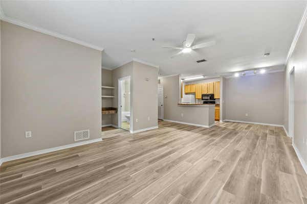 9918 COURTNEY PALMS BLVD APT 204, TAMPA, FL 33619, photo 4 of 37