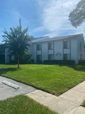 1261 PINE RIDGE CIR W APT G1, TARPON SPRINGS, FL 34688 - Image 1