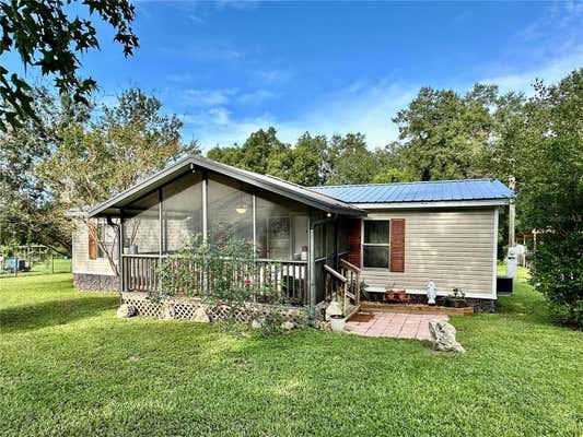 8623 MICARTA LN, ZEPHYRHILLS, FL 33541, photo 3 of 46