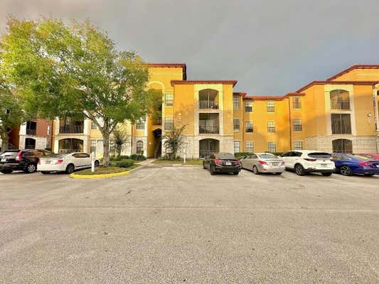 6153 METROWEST BLVD UNIT 102, ORLANDO, FL 32835 - Image 1