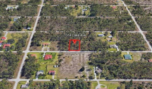 134 LAKE AVE, LEHIGH ACRES, FL 33936, photo 2 of 4