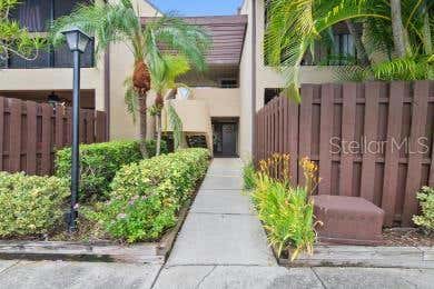 770 VILLAGE LAKE TER N APT 104, SAINT PETERSBURG, FL 33716 - Image 1