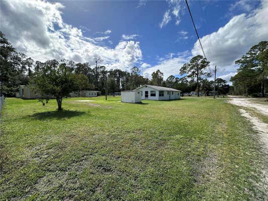 55028 6TH ST, ASTOR, FL 32102 - Image 1