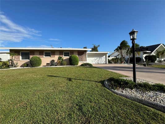 1009 CHERRY HILLS DR, SUN CITY CENTER, FL 33573 - Image 1