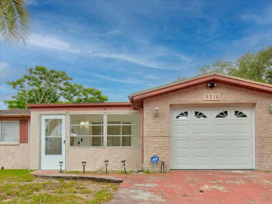 9316 MARK TWAIN LN, PORT RICHEY, FL 34668, photo 2 of 81