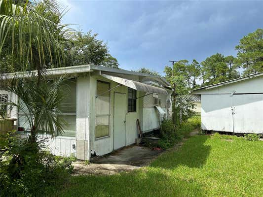 23931 BOBCAT RD, ASTOR, FL 32102 - Image 1