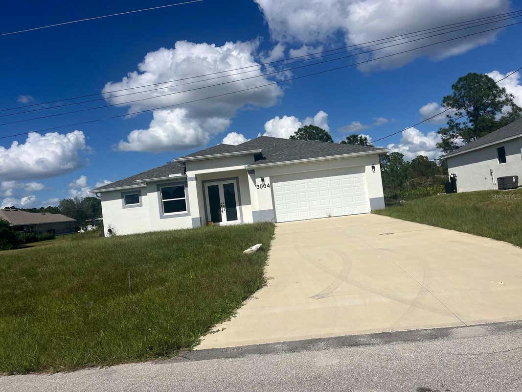 3004 47TH ST W, LEHIGH ACRES, FL 33971, photo 1 of 12