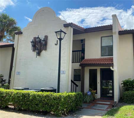 3505 TARPON WOODS BLVD APT J408, PALM HARBOR, FL 34685 - Image 1